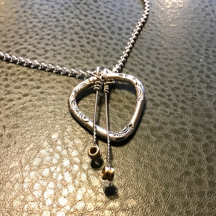 "Pick your position" pendant with  TWO played strings